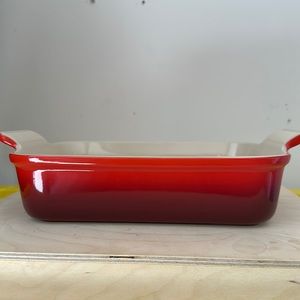 Ceramic Le Creuset casserole dish with handles